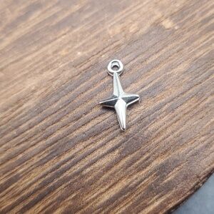 Sterling shining star charm P108‎